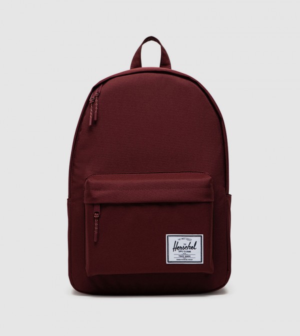 Buy Herschel Solid Essential Backpack In Maroon 6thStreet Qatar