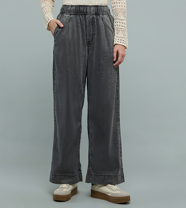 بنطلون جينز مغسول واسع بخصر مرن