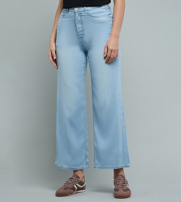 Washed Flared Jeans with Button Closure