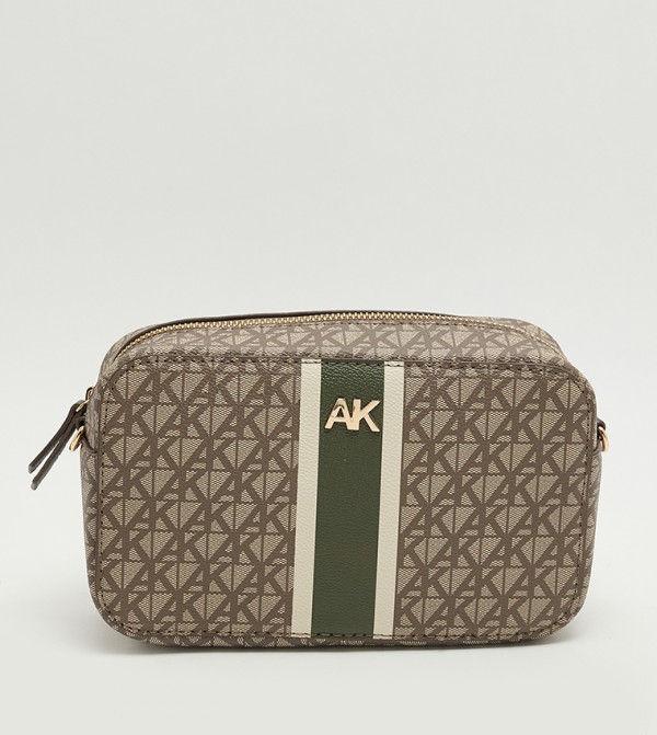 شنطة كاميرا نسائية بسحّاب ونقشة مونوغرام 