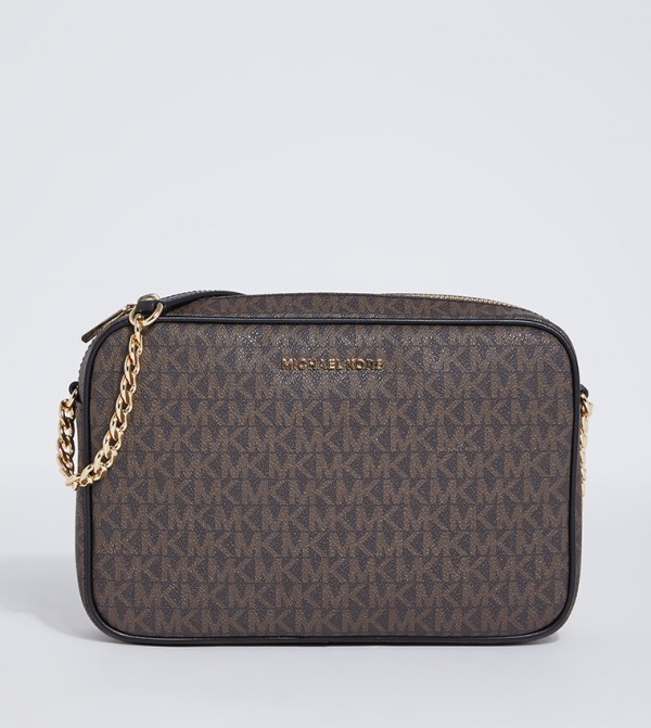 Buy Michael Kors JET Monogram Crossbody Bag In Brown | 6thStreet Saudi ...