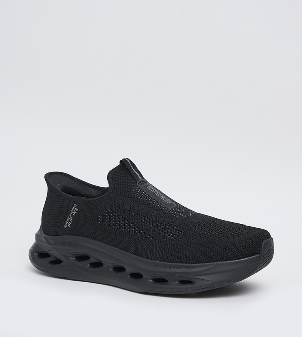 Buy Skechers Max Cushioning Glide Step Slip On Shoes In Black