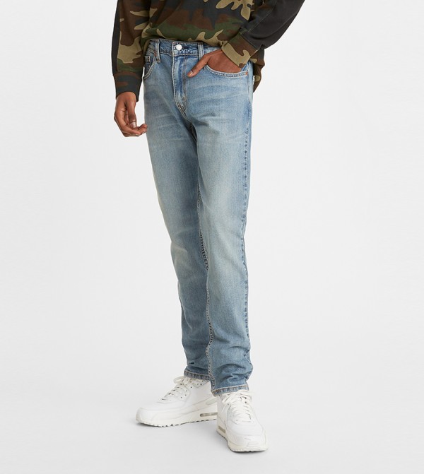512™ Slim Fit Tapered Jeans