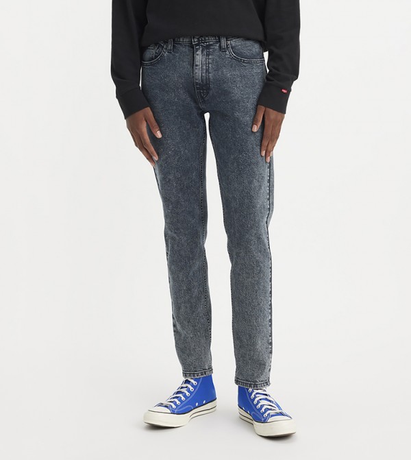 512™ Mid Tapered Jeans