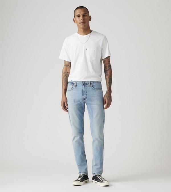 512™ Faded Slim Tapered Fit Jeans