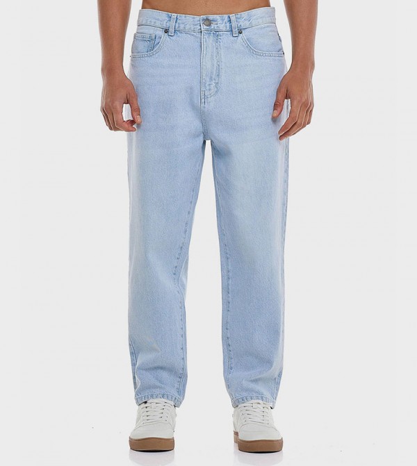 Washed Tapered Fit Jeans with Button Closure