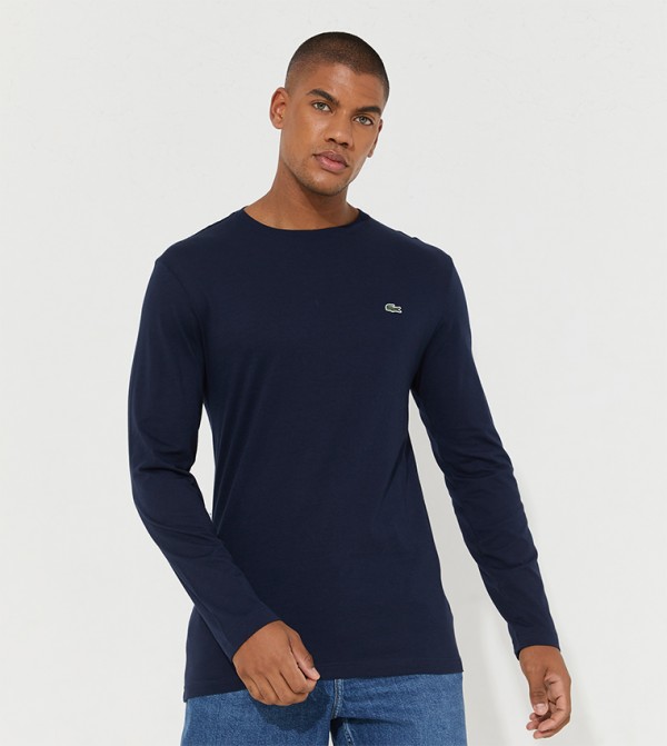 Buy Lacoste Long Sleeves Crew Neck T Shirt In Blue 6thStreet Qatar