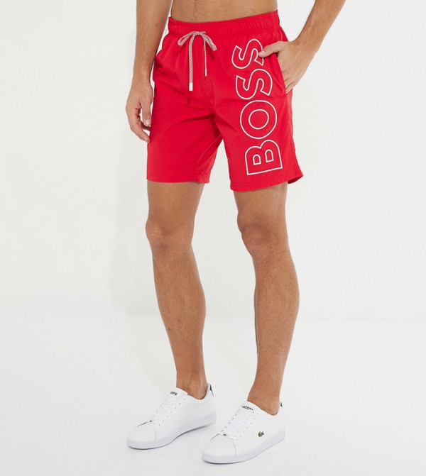 BOSS - Quick-dry swim shorts with monogram print