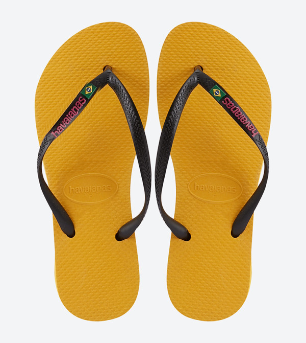 Buy Havaianas Slim Brasil Logo Flip Flops In Yellow 6thStreet UAE