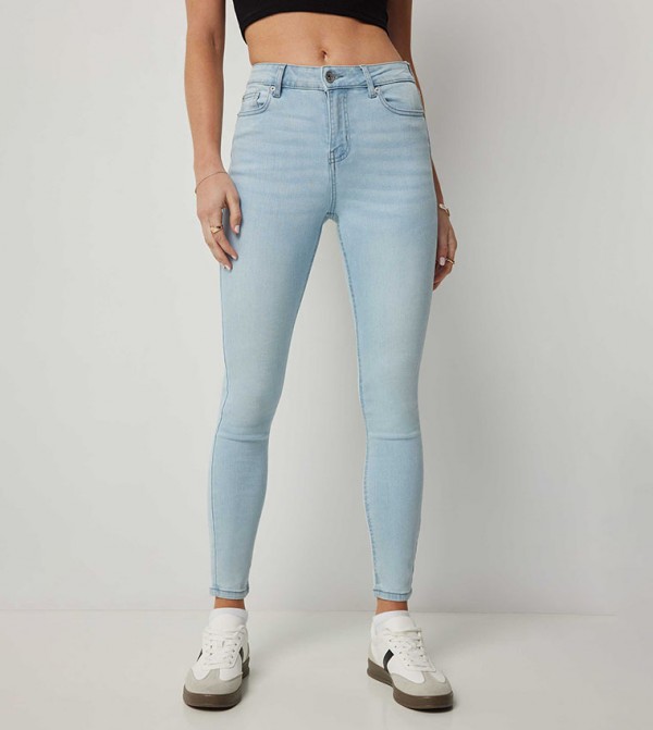 بنطال جينز سكيني بخصر متوسط