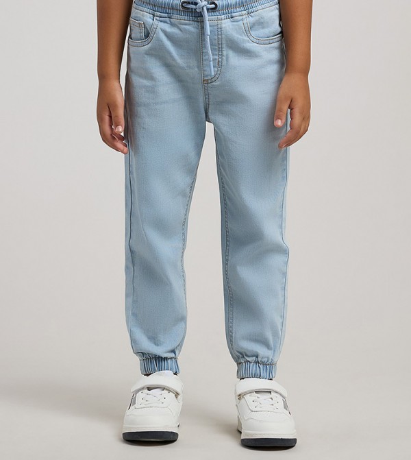 جينز رياضي باهت برباط خصر