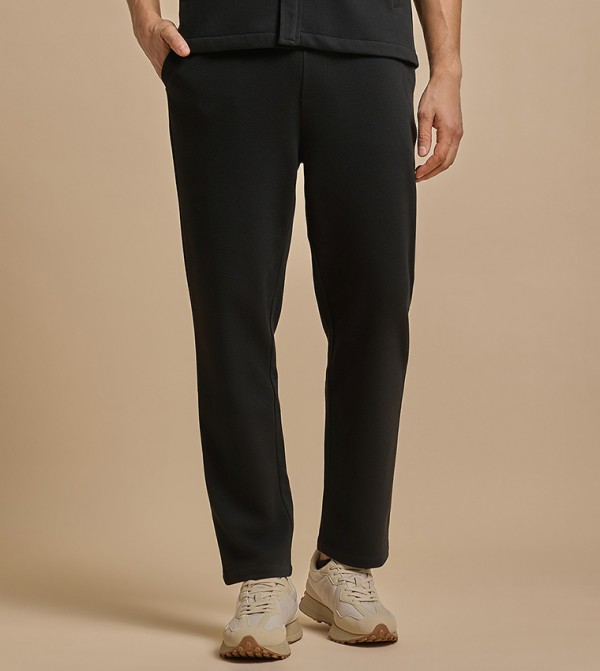 Solid Relaxed Fit Trousers with Button Closure