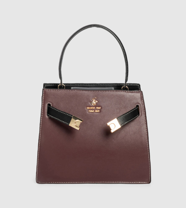 شنطة يد نسائية بشعار