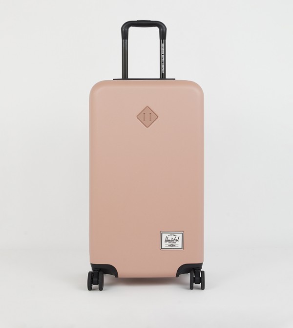 Herschel pink carry on best sale