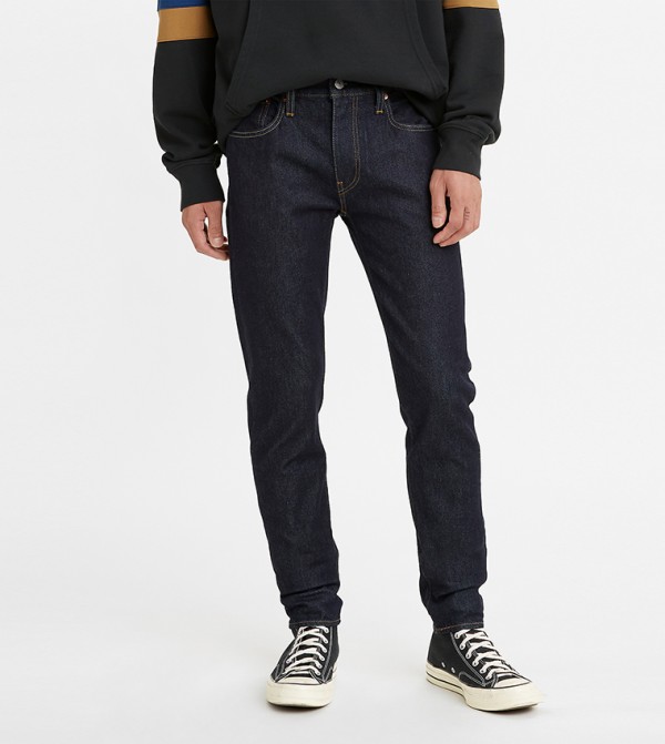 Mid-Rise Skinny Taper Jeans