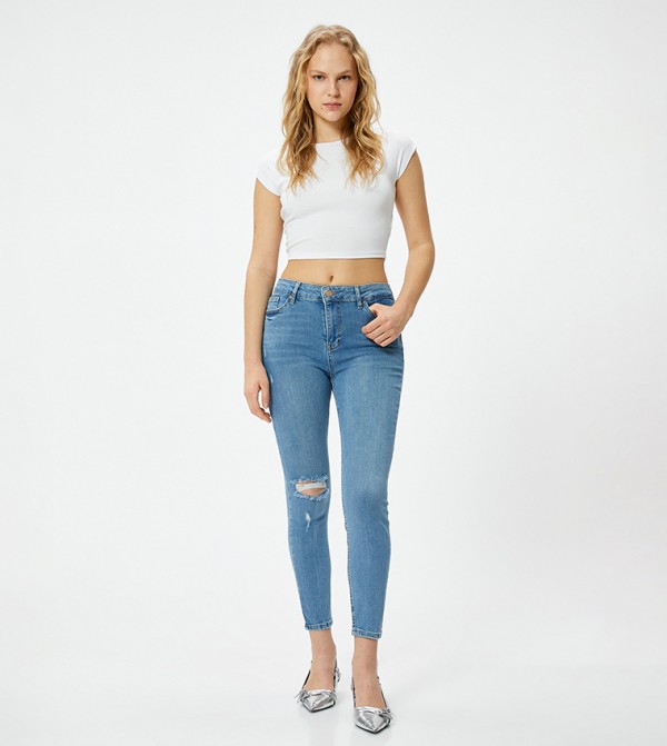 جينز ممزق ضيق