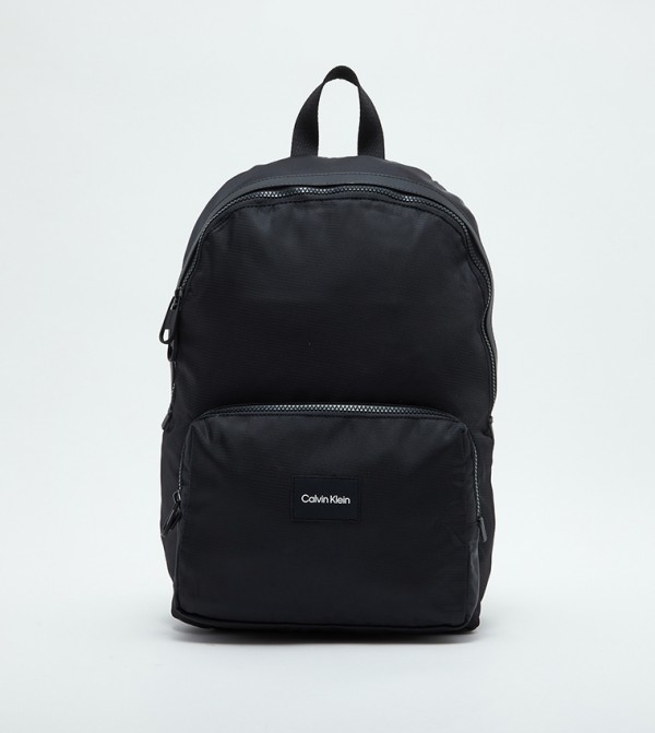 Calvin Klein Monogram Small Key Item Backpack in Brown | Lyst