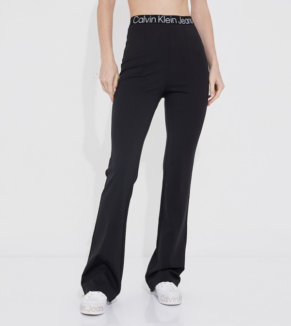 Buy Calvin Klein Logo Waistband Flared Leggings In Black
