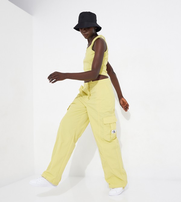 Buy Calvin Klein Logo Badge Cargo Pants In Yellow