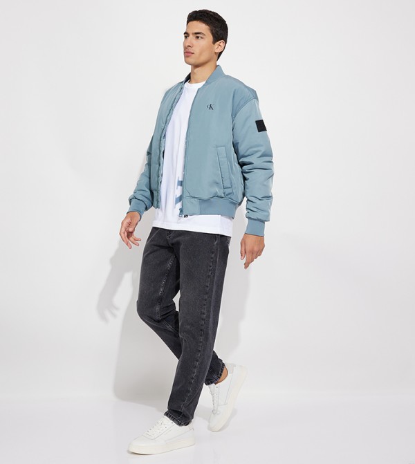 Washed Mid Rise Tapered Fit Jeans