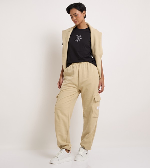 Logo Badge Detail Elastic Waist Pants