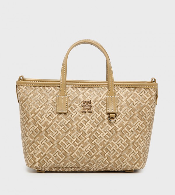 شنطة توت جلد بنقشة مونوغرام 