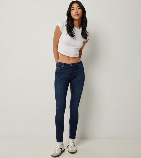 Washed Mid Rise Jeggings