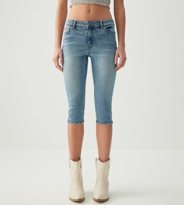 Faded Mid Rise Capri Jeans