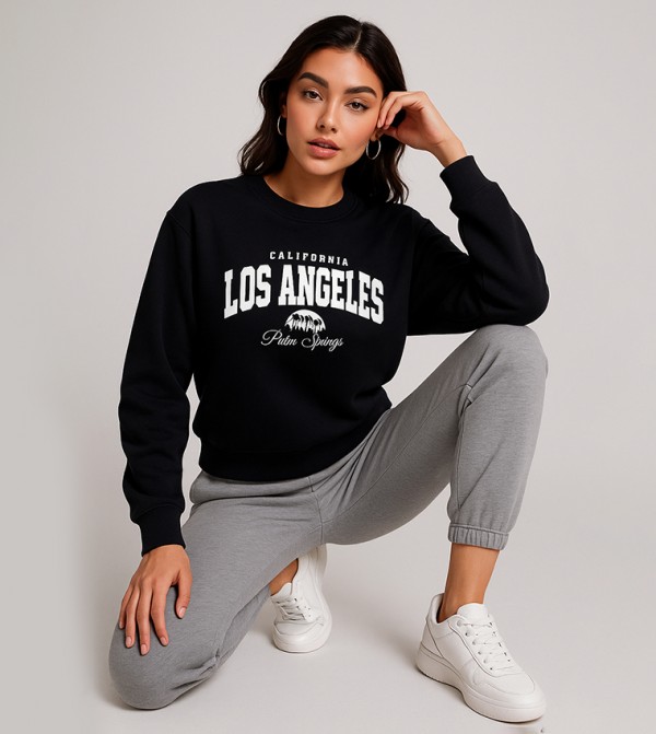 سويتشيرت قطن فليس بطبعة ورقبة مستديرة 