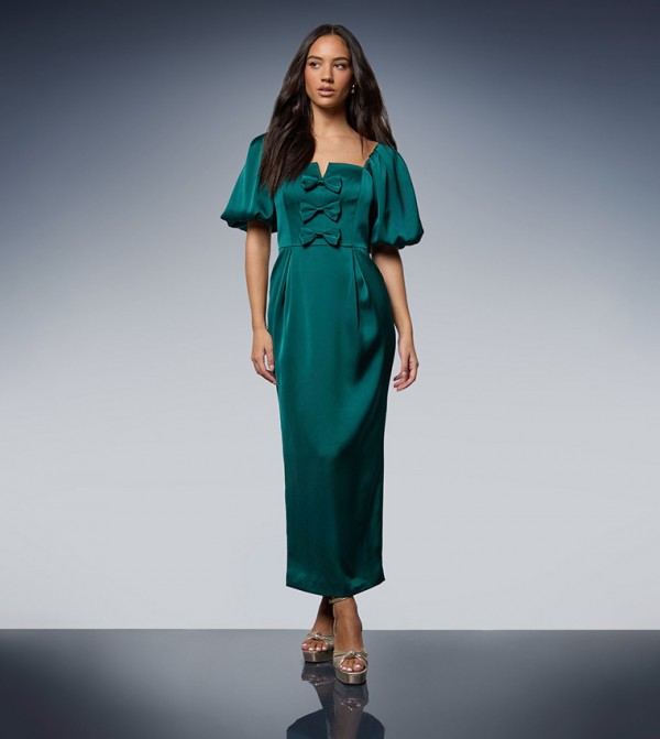 فستان ميدي ساتان بفيونكة امامية وكم باف 