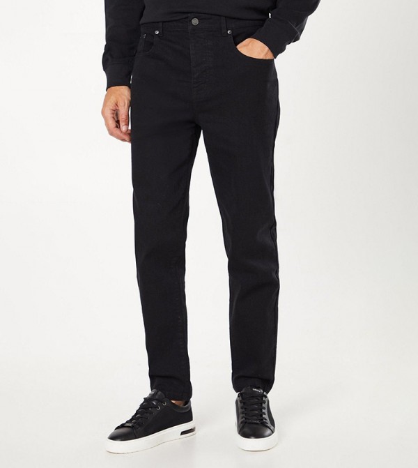Washed Mid Rise Tapered Jeans