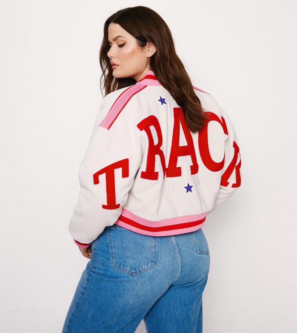 Buy Nasty Gal Texas Back Knit Varsity Jacket In Ecru 6thStreet Qatar