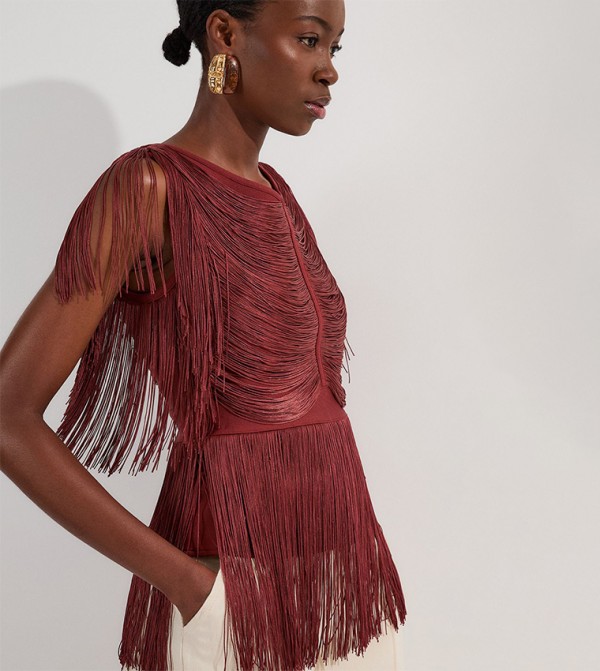 توب منسوج بشراشيب منسدلة