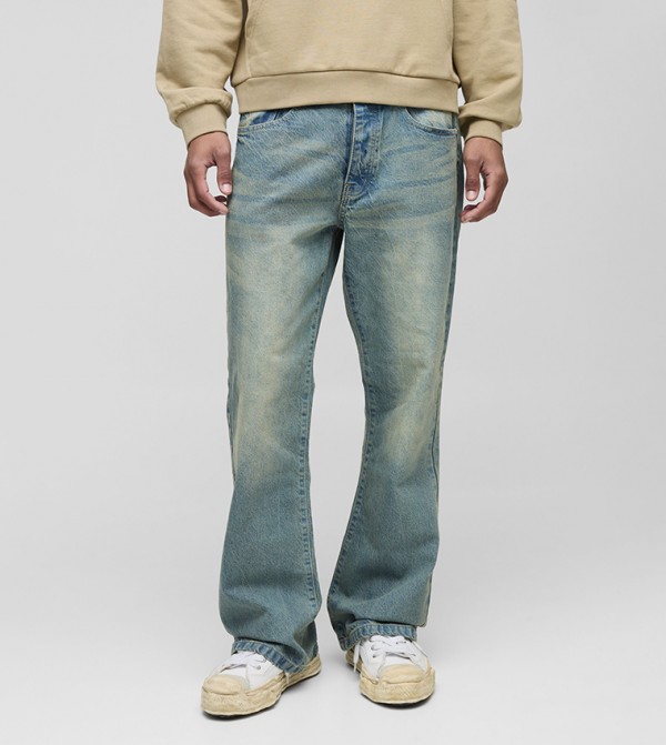 Rigid Faded Mid Rise Flared Jeans