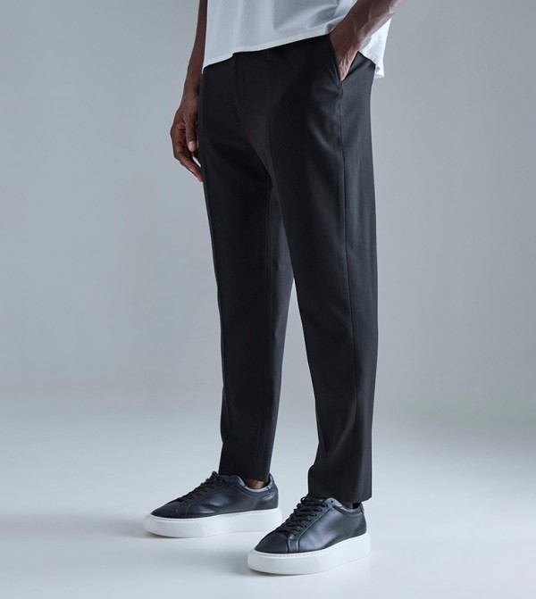 Solid High Rise Tapered Fit Trousers