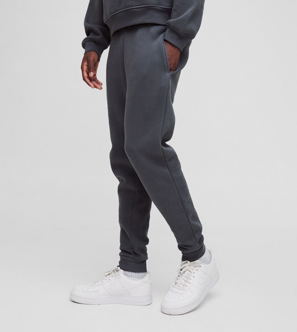 Solid Mid Rise Slim Fit Joggers