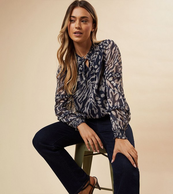 توب بأكمام مكشكشة بطبعة حيوان 