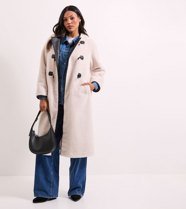 جاكيت بأزرار كبس