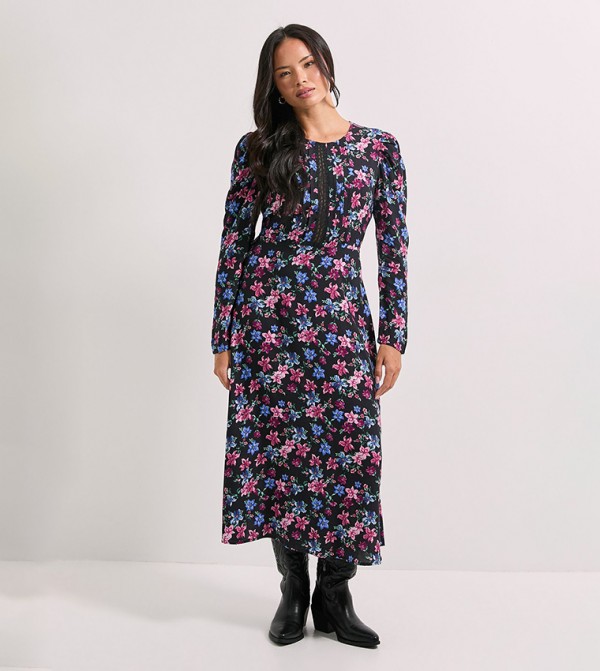 فستان ميدي بطبعة وكم طويل