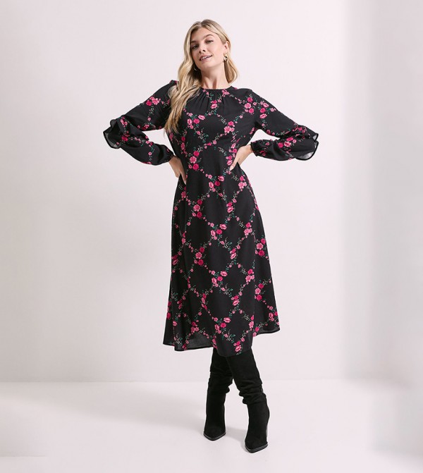 فستان ميدي بطبعة ورود بكشكشة وكم طويل