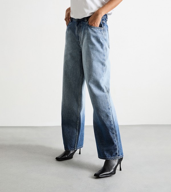 بنطال جينز واسع بخصر عالي