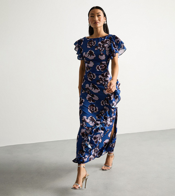 فستان ماكسي بفتحة جانبية وحافة مكشكشة وطبعة للمقاسات الصغيرة