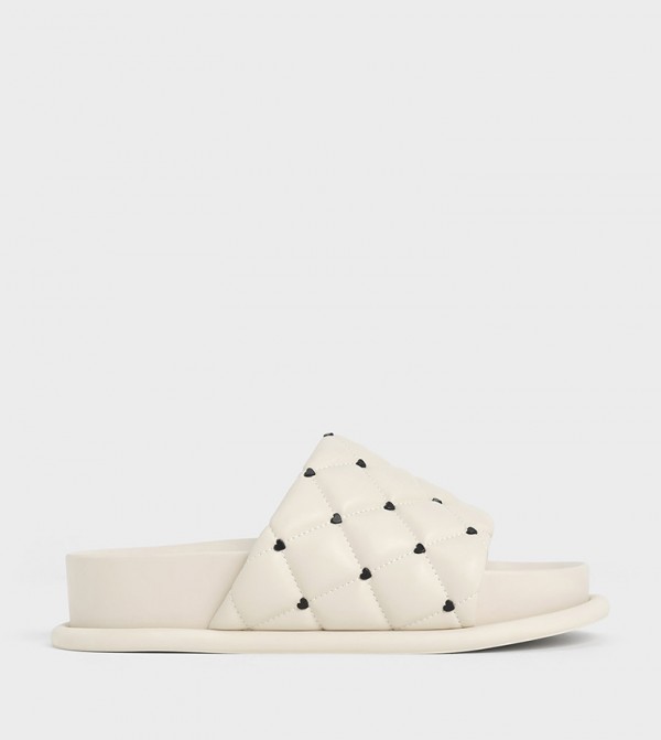 Buy Charles & Keith DAHLIA Padded Quilted Slides In Beige | 6thStreet Qatar