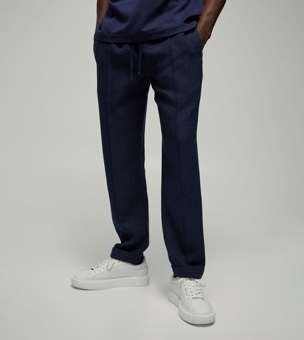 Mid Rise Tapered Fit Turn Up Hem Trousers