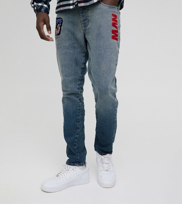Appliqued Badge Washed Gusset Slim Fit Jeans