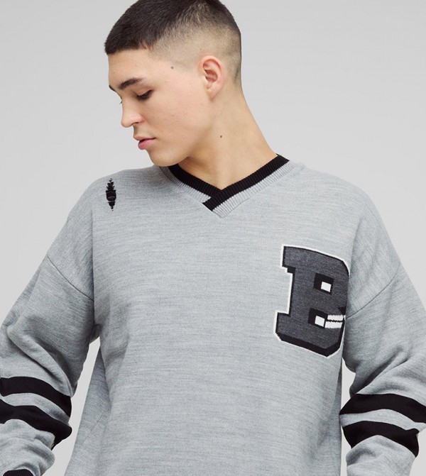 Distressed Varsity V-Neck Boxy Fit Sweater