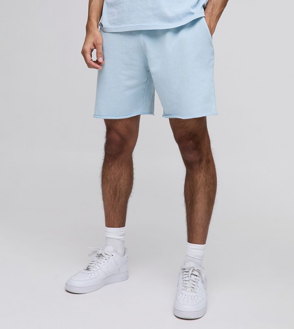 Relaxed Fit Mid Rise Raw Hem Washed Loopback Shorts