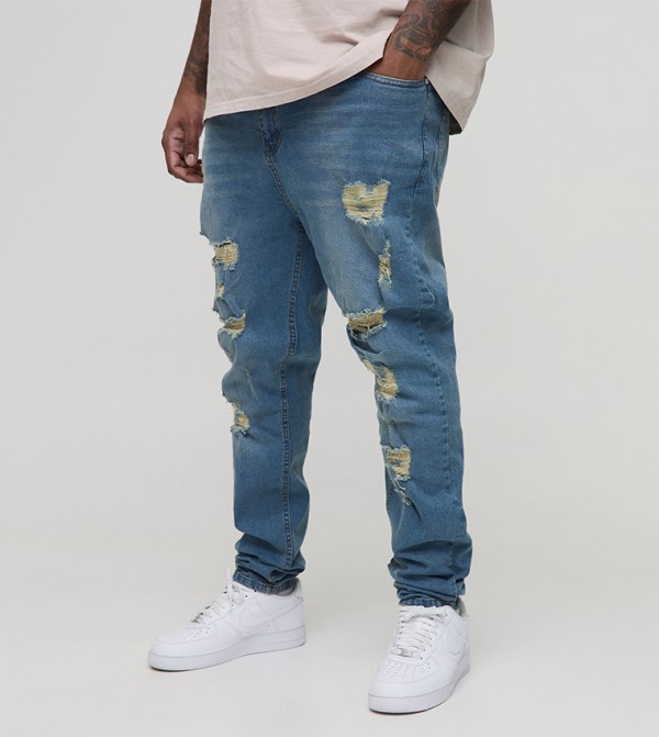 Ripped Mid Rise Slim Fit Jeans