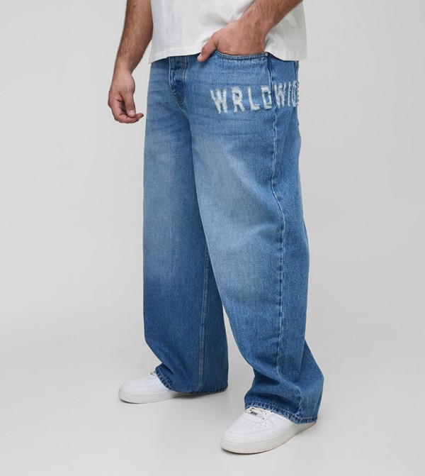 Worldwide Distressed Relaxed Fit Jeans