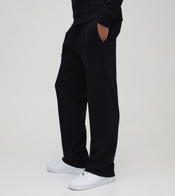 Relaxed Fit Pintuck Split Hem Interlock Sweatpants